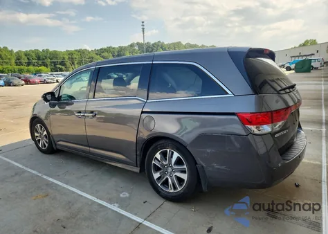 2015 Honda Odyssey Touring from USA, damaged, VIN 5FNRL5H9XFB001410